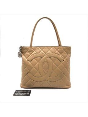 Chanel CC Logo Quilted Caviar Leather Tote Medallion Beige Silver